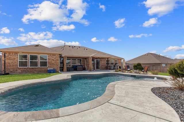 view of pool featuring outdoor lounge area and a patio area