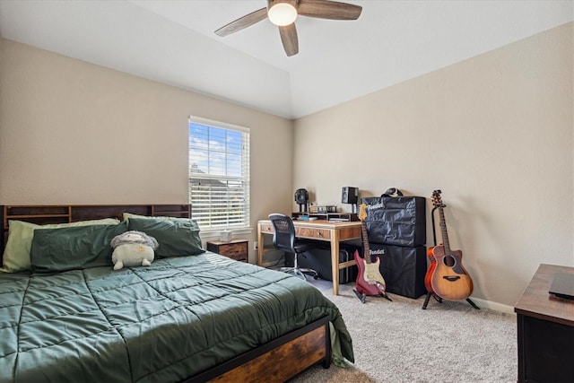 carpeted bedroom with lofted ceiling and ceiling fan