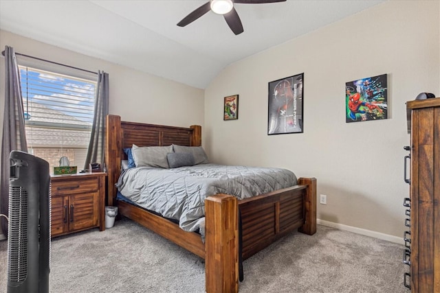 bedroom with vaulted ceiling, light carpet, and ceiling fan