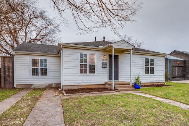 view of front of home with a front lawn