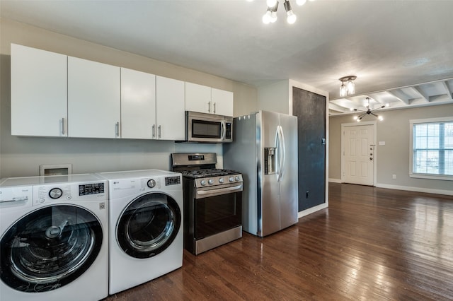 washroom featuring dark hardwood / wood-style floors, independent washer and dryer, and a chandelier