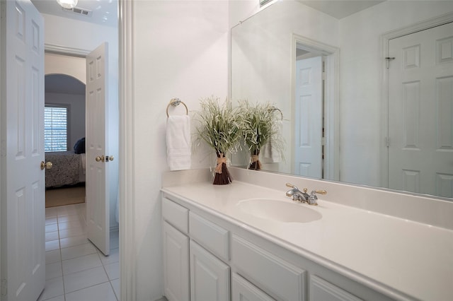 bathroom featuring vanity and tile patterned flooring