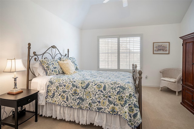 bedroom with lofted ceiling, light carpet, and ceiling fan