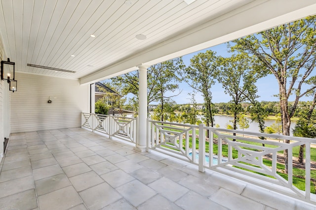 view of patio / terrace featuring a water view