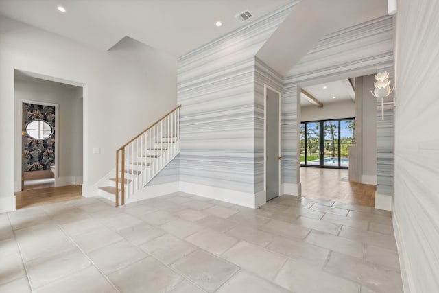 foyer entrance featuring light tile patterned floors