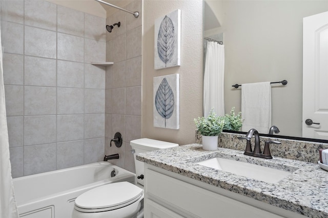 full bathroom with vanity, shower / bath combination with curtain, and toilet