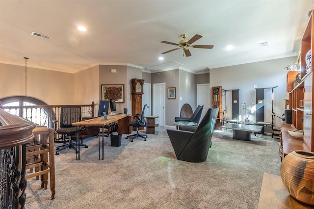 office area featuring crown molding, ceiling fan, and carpet