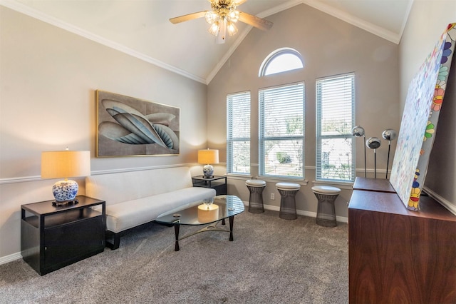 sitting room with ceiling fan, ornamental molding, high vaulted ceiling, and carpet