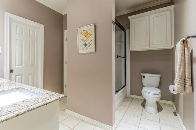 full bathroom featuring tile patterned flooring, bath / shower combo with glass door, vanity, ornamental molding, and toilet