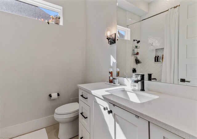 full bathroom with a shower with shower curtain, toilet, tile patterned flooring, and vanity