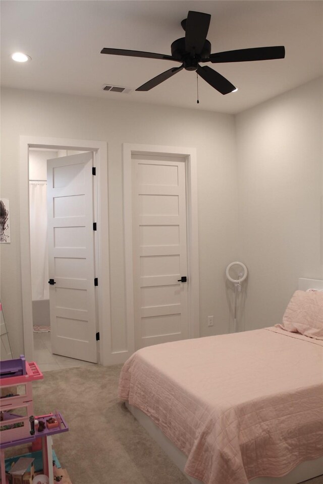 carpeted bedroom with recessed lighting, a ceiling fan, and visible vents