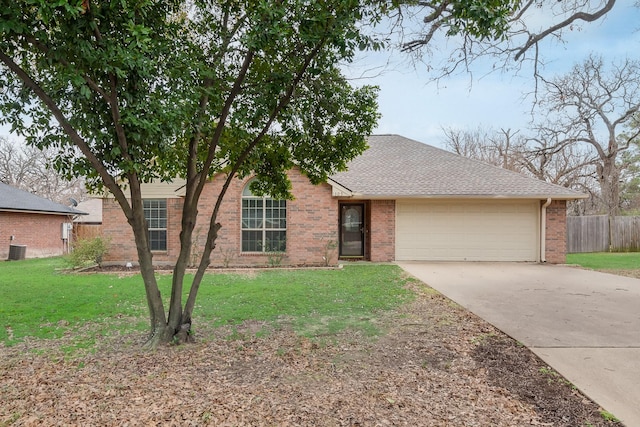 single story home featuring a garage, central AC, and a front yard