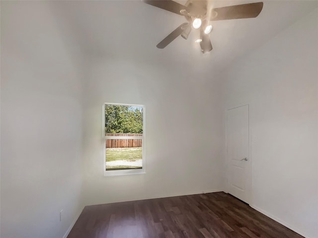 empty room featuring dark hardwood / wood-style flooring and ceiling fan