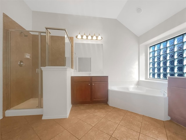 bathroom featuring lofted ceiling, vanity, tile patterned flooring, and plus walk in shower