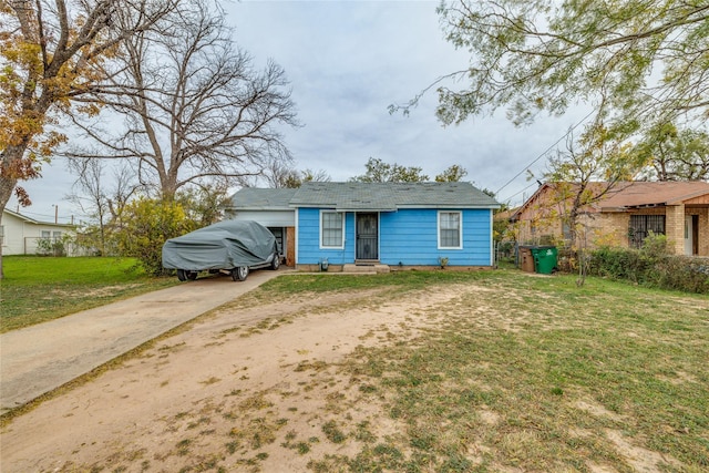 bungalow with a front lawn