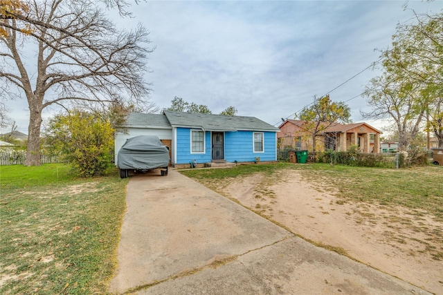 bungalow with a front yard