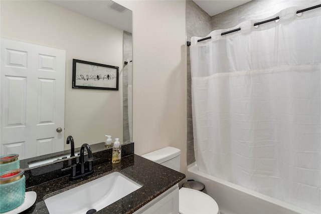 full bathroom with vanity, toilet, and shower / bath combo