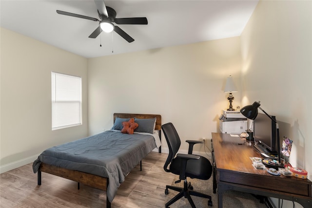 bedroom featuring ceiling fan and light hardwood / wood-style floors