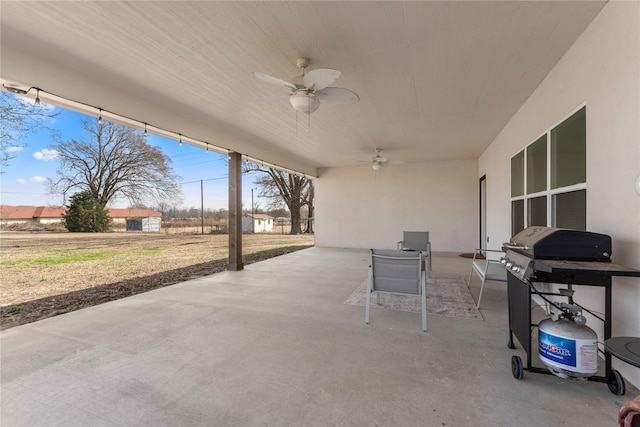 view of patio featuring ceiling fan