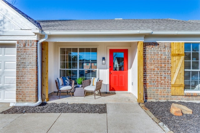 property entrance with a garage