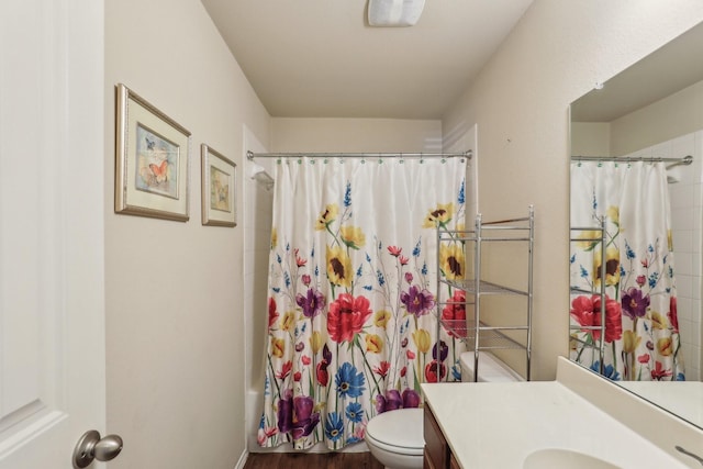 full bathroom with vanity, toilet, and shower / bath combo