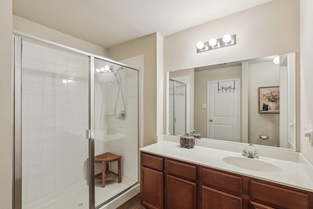 bathroom featuring vanity and walk in shower