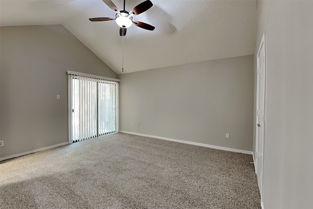 spare room featuring ceiling fan, carpet flooring, and high vaulted ceiling