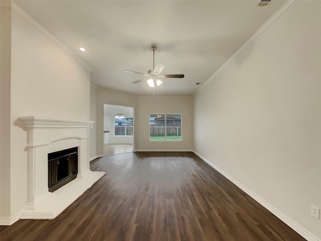 unfurnished living room with crown molding, dark hardwood / wood-style floors, and ceiling fan