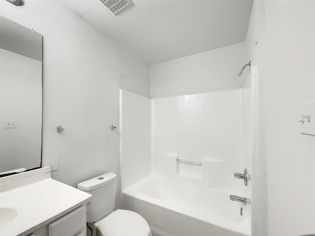 full bathroom with vanity, washtub / shower combination, and toilet