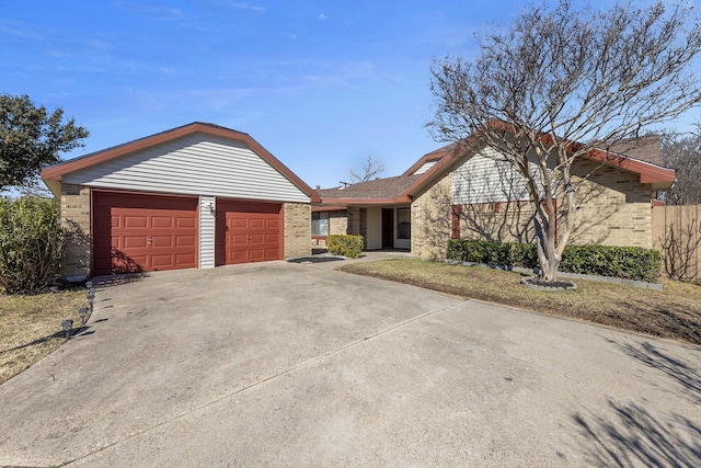 single story home featuring a garage