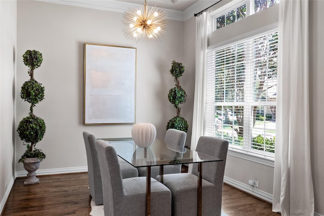 dining room with ornamental molding, dark wood-type flooring, and a chandelier