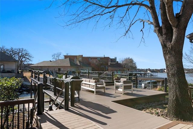 wooden terrace with a water view