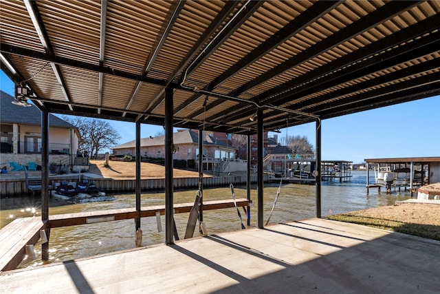 dock area featuring a water view