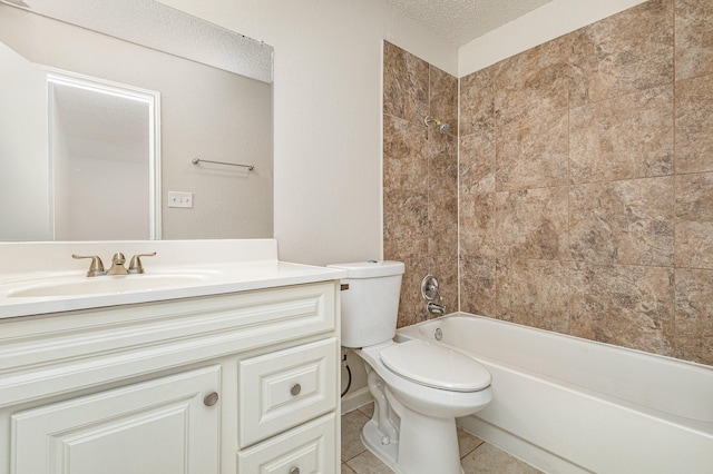 full bathroom with tile patterned flooring, tiled shower / bath, vanity, and a textured ceiling