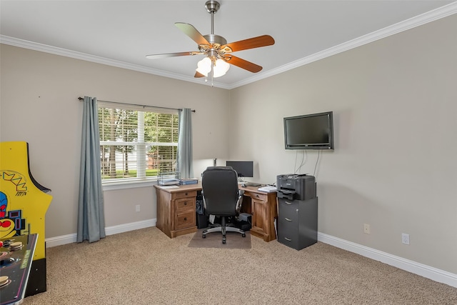 carpeted home office with crown molding and ceiling fan