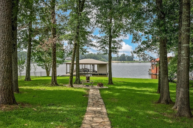 exterior space featuring a water view and a dock