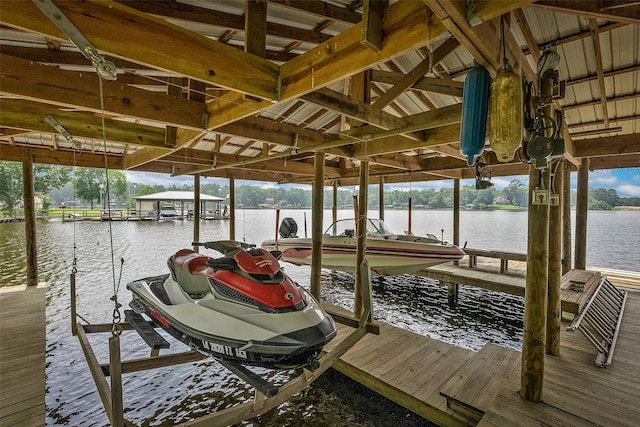 dock area featuring a water view