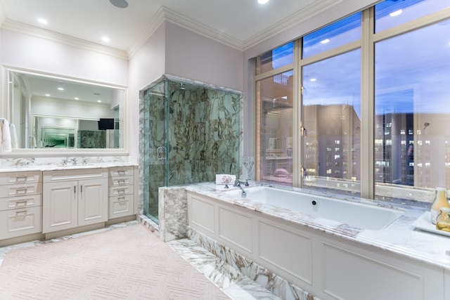 bathroom with crown molding, vanity, and independent shower and bath