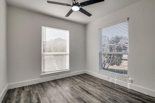 unfurnished room with ceiling fan, baseboards, and wood finished floors