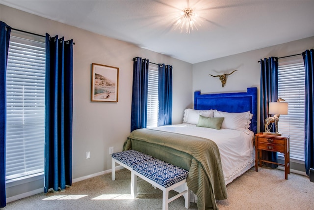 bedroom featuring ceiling fan and carpet flooring