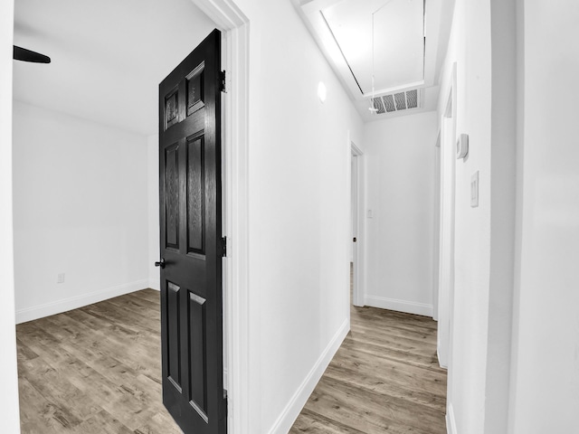 hallway featuring light hardwood / wood-style flooring