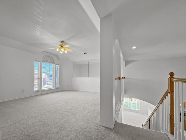 carpeted empty room with ceiling fan