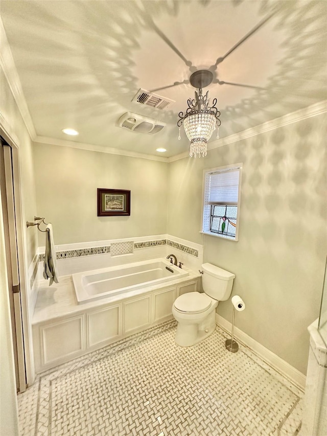 full bathroom featuring toilet, visible vents, baseboards, a bath, and crown molding