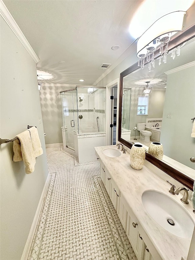 bathroom with crown molding, a stall shower, visible vents, and a sink