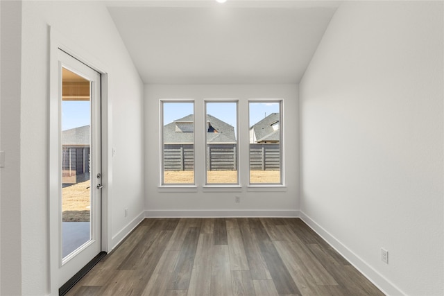 7221 Ladybug, Little Elm, TX 76227 - empty room featuring dark wood-style floors, baseboards, and vaulted ceiling