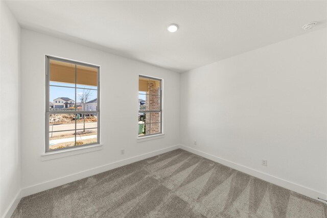 7221 Ladybug, Little Elm, TX 76227 - carpeted empty room featuring baseboards and recessed lighting