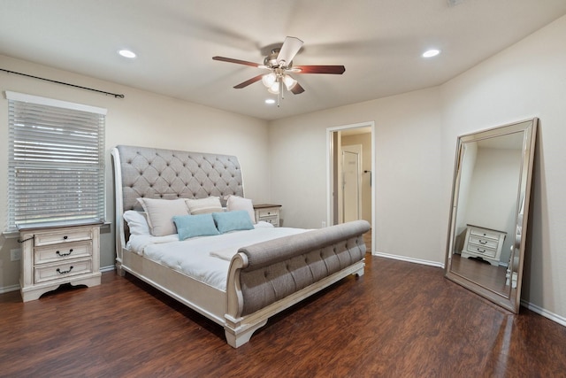 bedroom featuring dark hardwood / wood-style flooring and ceiling fan