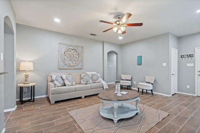 living room with ceiling fan