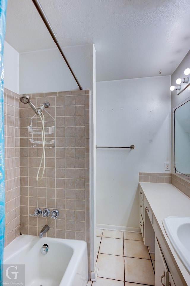 bathroom featuring vanity, shower / tub combo, tile patterned floors, and a textured ceiling