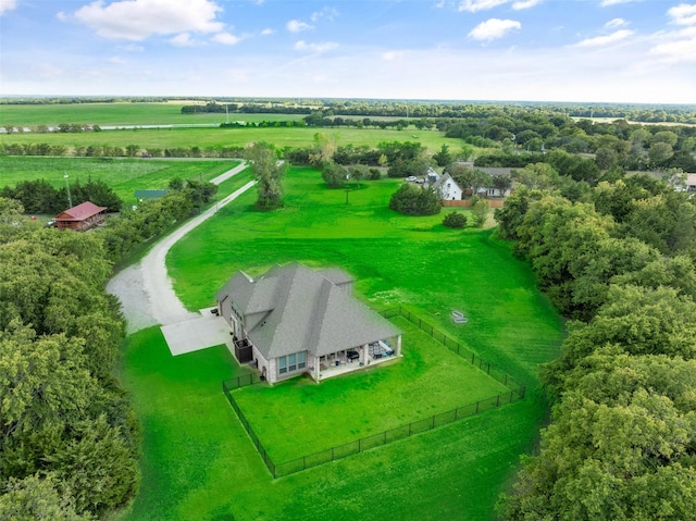 birds eye view of property with a rural view